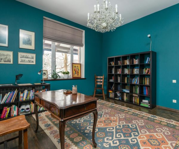 This image shows a interior design of a room painted blue and white to showcase the purpose of interior painting. This image is used in interior painting section.